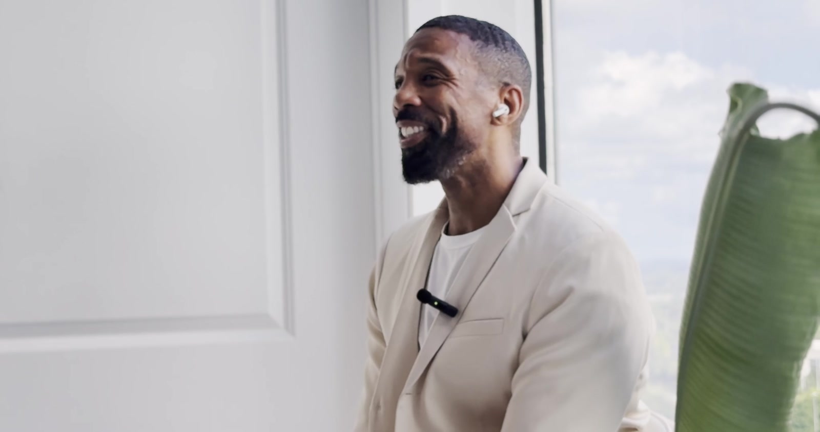 Sharif, your LifeCoachATL coach, smiling during a conversation